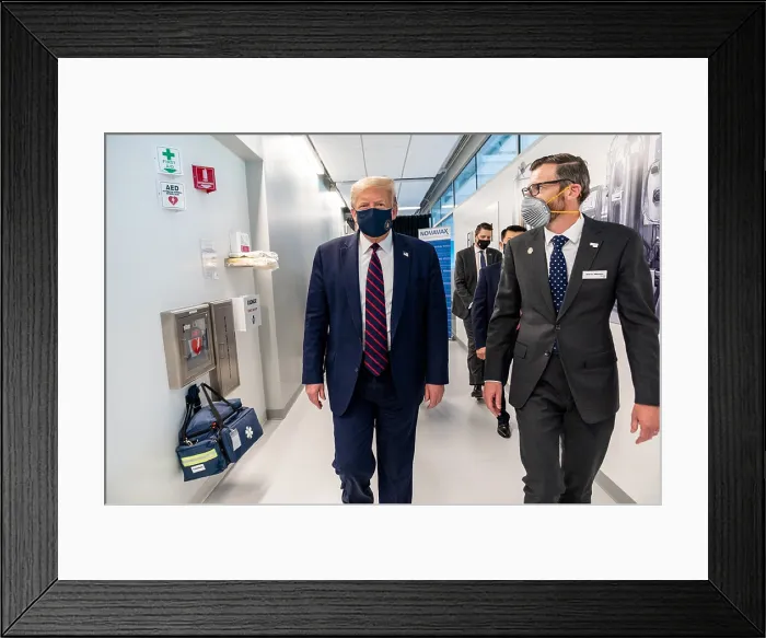 Framed Print : President Donald Trump wears a facemask with a Presidential seal during a tour of Fujifilm Diosynth Biotechnologies, July 27, 2020