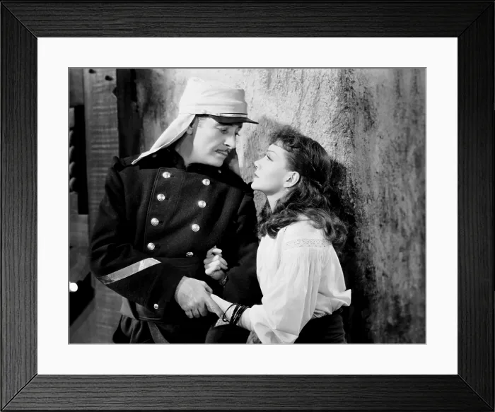 Framed Print : UNDER TWO FLAGS, from left, Ronald Colman, Claudette Colbert, 1936, 20th Century Fox, TM & Copyright / Courtesy: Everett Collection Framed Print : UNDER TWO FLAGS, from left, Ronald Colman, Claudette Colbert, 1936, 20th Century Fox, TM & Copyright / Courtesy: Everett Collection