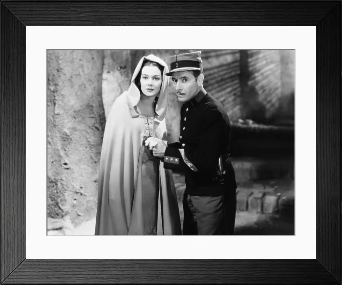 Framed Print : UNDER TWO FLAGS, from left, Rosalind Russell, Ronald Colman, 1936, 20th Century Fox, TM & Copyright / Courtesy: Everett Collection