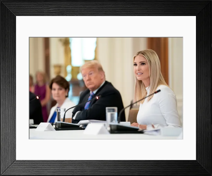 Framed Print : Ivanka Trump, speaks as co-chair of the American Workforce Policy Advisory Board. Her father, President Donald Trump, looks on, June 26, 2020 (BSLOC_2020_5_9)