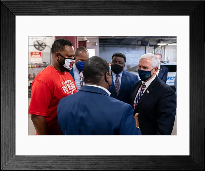 Framed Print : Vice President Mike Pence, wears a black facemask decorated with a Presidential seal