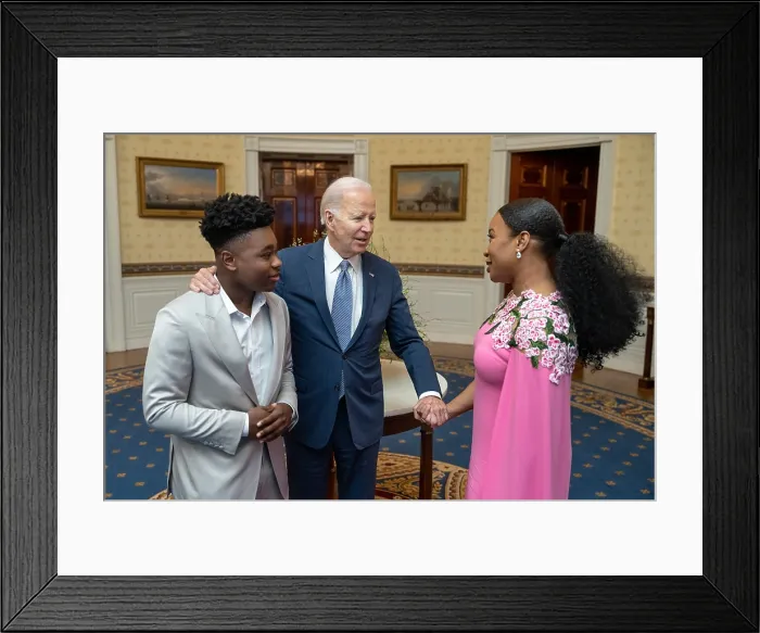 Framed Print : President Joe Biden greets cast members Jalyn Hall and Danielle Deadwyler before a screening of the movie Till, in the White House Blue Room, Feb. 16, 2023