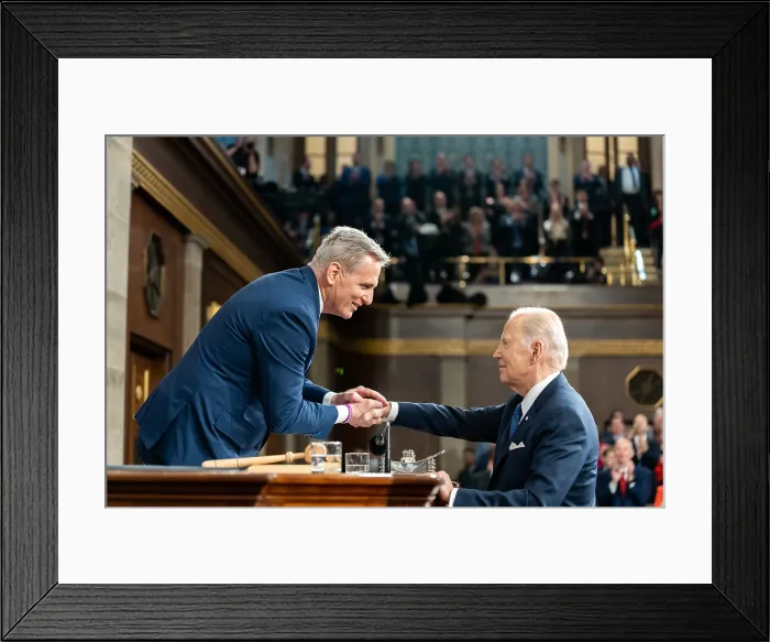 Framed Print : Republican Speaker Kevin McCarthy greets President Joe Biden as he arrives to deliver his State of the Union address, Feb. 7, 2023, at the US Capitol in Washington, DC