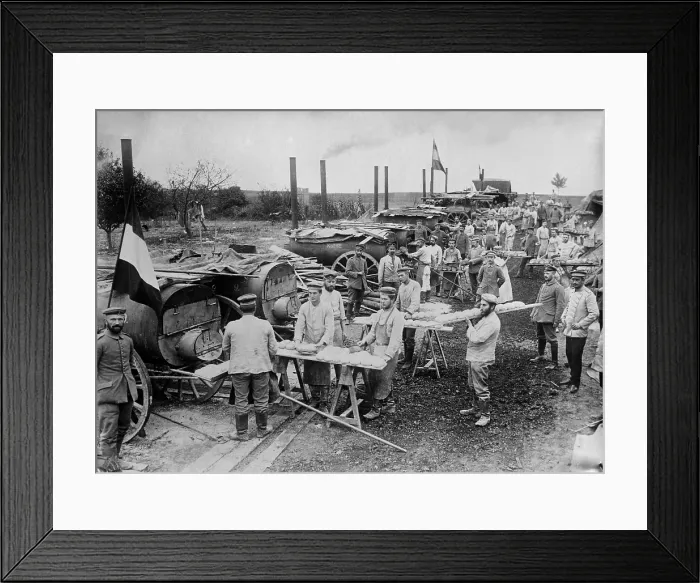 Framed Print : World War 1. German field bakery with soldiers cooking bread in mobile ovens near Ypres, Belgium during World War I. 1914