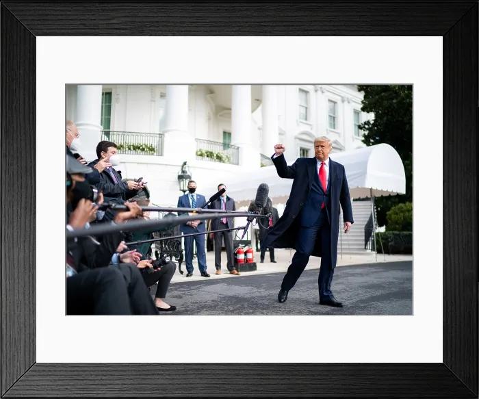Framed Print : President Donald Trump gives a clenched salute to the press and photographers, prior to boarding Marine One, Oct. 30, 2020 Framed Print : President Donald Trump gives a clenched salute to the press and photographers, prior to boarding Marine One, Oct. 30, 2020