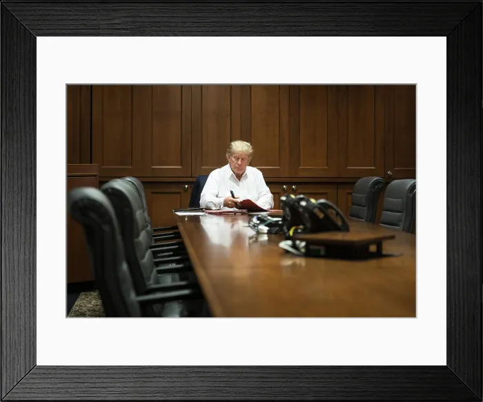 Framed Print : President Donald Trump works in the conference room of the Presidential Suite at Walter Reed National Military Medical Center in Bethesda, Maryland, Oct. 3, 2020