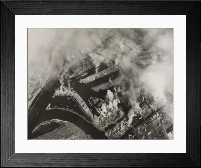 Framed Print : Aerial view after Allied bombing of Howaldtswerke shipbuilding yards in Hamburg, Germany. U.S. B-17 Flying Fortresses bombed the target on August 4, 1943. World War 2 Framed Print : Aerial view after Allied bombing of Howaldtswerke shipbuilding yards in Hamburg, Germany. U.S. B-17 Flying Fortresses bombed the target on August 4, 1943. World War 2