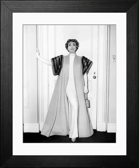 Framed Print : TORCH SONG, Joan Crawford, in a camel's-hair coat with mink trim, by Helen Rose, 1953