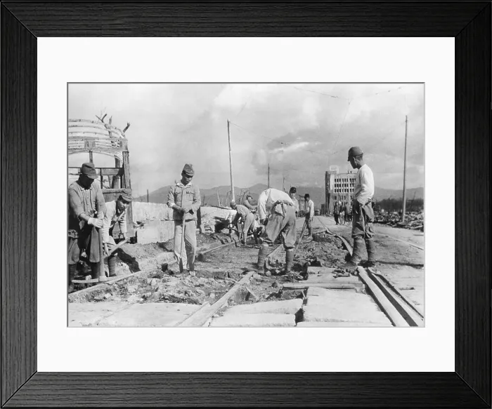 Framed Print : Japanese soldiers repair street car tracks in devastated Hiroshima after the end of World War 2 Framed Print : Japanese soldiers repair street car tracks in devastated Hiroshima after the end of World War 2