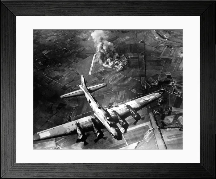 Framed Print : B-17 Bomber during the first big raid on Germany by the U.S. 8th Air Force. The raid destroyed most of the Marienburg Focke-Wulf aircraft factory. World War 2