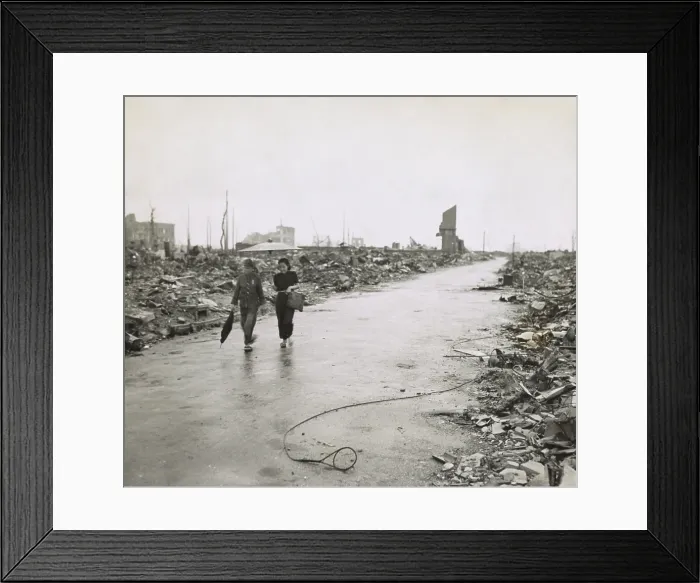Framed Print : Two Japanese civilians walk through cleared path in Hiroshima's ruins. Sept. 7, 1945. (BSLOC_2014_6_87) Framed Print : Two Japanese civilians walk through cleared path in Hiroshima's ruins. Sept. 7, 1945. (BSLOC_2014_6_87)