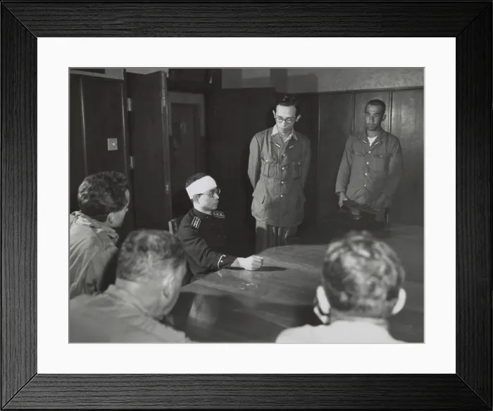 Framed Print : Hirokuni Dazai, bandaged leader of Hiroshima local police, tells American military of the atomic bombing