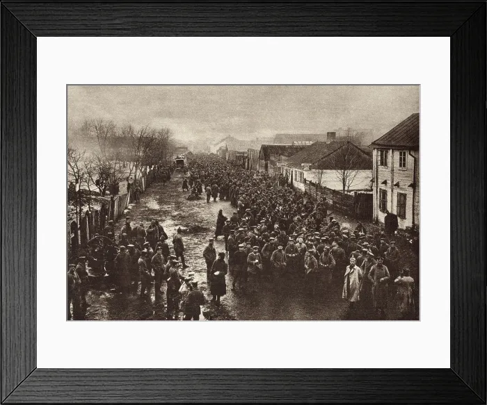 Framed Print : World War 1. Russian soldiers captured by the Germans at Tannenberg passing through a border town on the way to detention camps in Germany Framed Print : World War 1. Russian soldiers captured by the Germans at Tannenberg passing through a border town on the way to detention camps in Germany