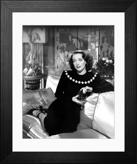 Framed Print : HUMORESQUE, Joan Crawford, in a dress by Adrian, 1946