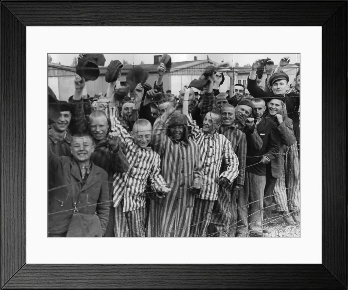 Framed Print : Dachau Prisoners wave and cheer the Seventh US Army liberators from behind a barbed wire fence. April 29, 1945, World War 2 (BSLOC_2015_13_19) Framed Print : Dachau Prisoners wave and cheer the Seventh US Army liberators from behind a barbed wire fence. April 29, 1945, World War 2 (BSLOC_2015_13_19)