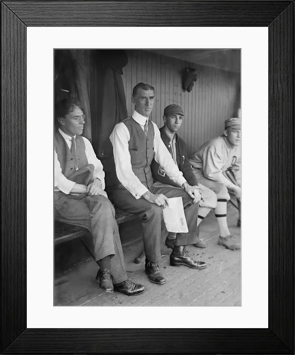 Framed Print : Connie Mack, manager of the Philadelphia Athletes in a dugout during a 1915 game in Washington, DC