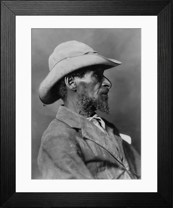 Framed Print : Profile portrait of African American man wearing a hat, is titled Boshe, presumably his name. Photo was created c. 1900-1902 by Lewis Francis Hanes (BSLOC_2017_20_116)