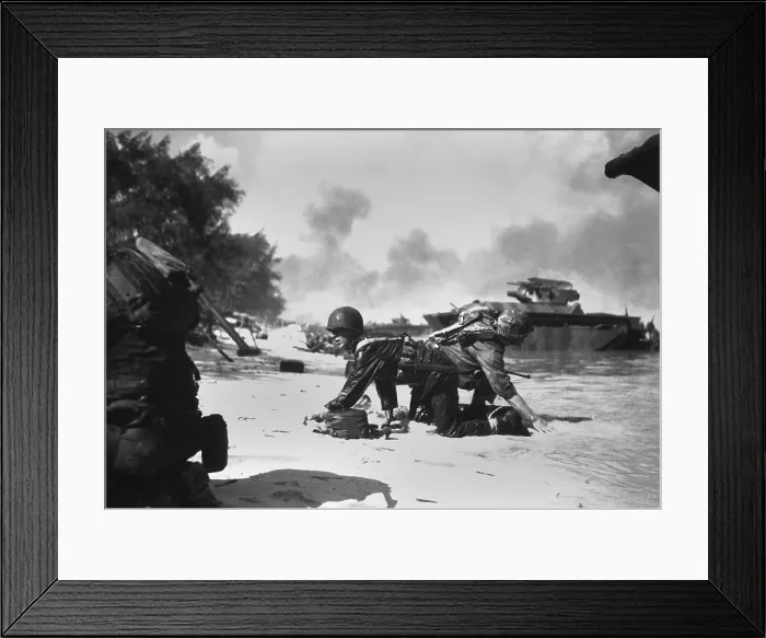 Framed Print : On Saipan, invading Marines under Japanese fire crawl to their assigned positions, June 1944. Many Marines landed on the wrong beaches, and had to get to their units