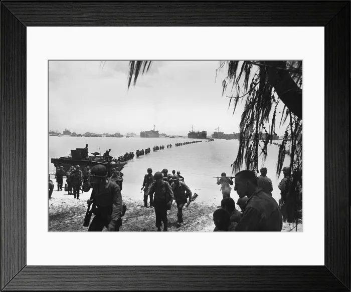 Framed Print : Army reinforcements wade ashore on Saipan without enemy opposition. They will relieve Marines in the battle of attrition raging in the island's interior