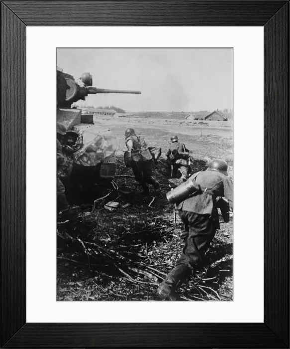 Framed Print : German troops during the invasion of Russia in 1941. The German soldiers advance past a tank, Aug. 12, 1941. (BSLOC_2013-12_2) Framed Print : German troops during the invasion of Russia in 1941. The German soldiers advance past a tank, Aug. 12, 1941. (BSLOC_2013-12_2)