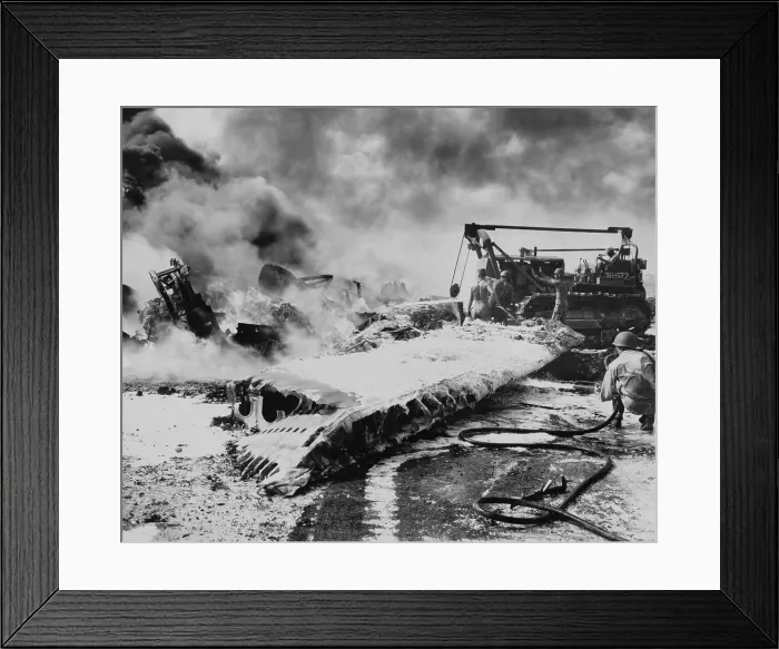 Framed Print : Fire and destruction after a mid-day Japanese air raid on U.S. Army Air Force base at Saipan Island. The first U.S Framed Print : Fire and destruction after a mid-day Japanese air raid on U.S. Army Air Force base at Saipan Island. The first U.S
