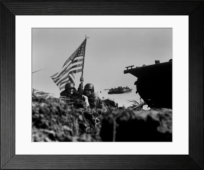 Framed Print : Soldiers plant the American flag on Guam eight minutes after U.S. assault troops landed Framed Print : Soldiers plant the American flag on Guam eight minutes after U.S. assault troops landed