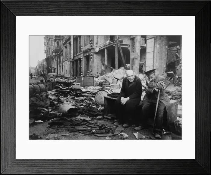 Framed Print : World War 2, Battle of Berlin, May 1945. Two elderly German men, one wearing the armband signifying blindness, the other his helper, sitting on a crate amid the rubble