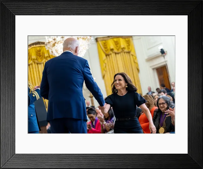 Framed Print : President Joe Biden presents the National Medal of Arts to actress Julia Louis-Dreyfus during a White House ceremony, March 21, 2023