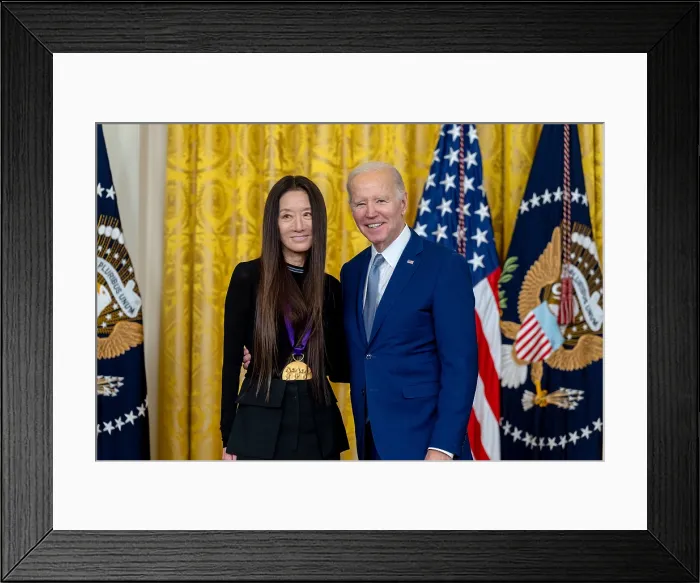 Framed Print : President Joe Biden presents the 2021 National Medal of the Arts to fashion designer, Vera Wang, March 21, 2023. She became famous for her designer wedding gowns, evening wear Framed Print : President Joe Biden presents the 2021 National Medal of the Arts to fashion designer, Vera Wang, March 21, 2023. She became famous for her designer wedding gowns, evening wear