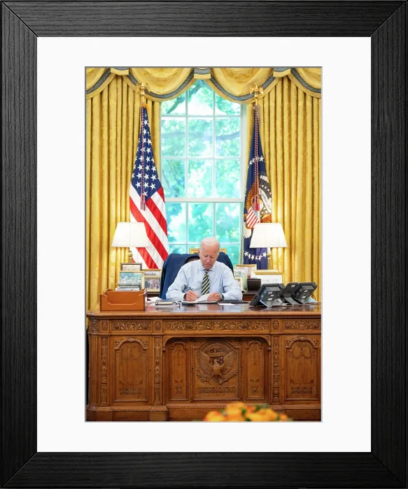 Framed Print : President Joe Biden seated in the White House Oval office at the Resolute desk, Aug. 31, 2023. (BSLOC_2023_8_1)