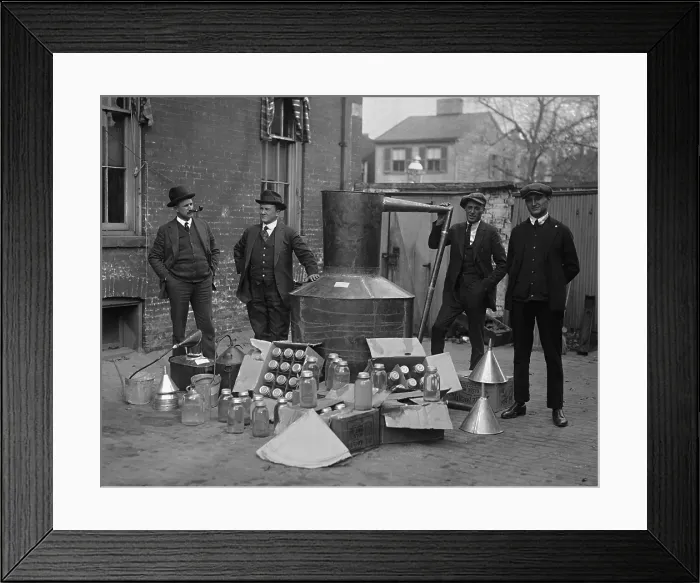 Framed Print : Prohibition agents stand with a still and mason jars used to distill hard liquor in Wash. D.C. area. Nov. 11, 1922 (BSLOC_2016_8_70) Framed Print : Prohibition agents stand with a still and mason jars used to distill hard liquor in Wash. D.C. area. Nov. 11, 1922 (BSLOC_2016_8_70)