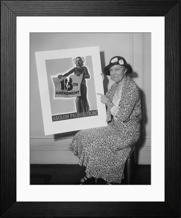 Framed Print : Woman holding a 1931 poster Abolish Prohibition! In 1933 state conventions ratified the Twenty-first Amendment, which repealed Prohibition (BSLOC_2016_8_74)