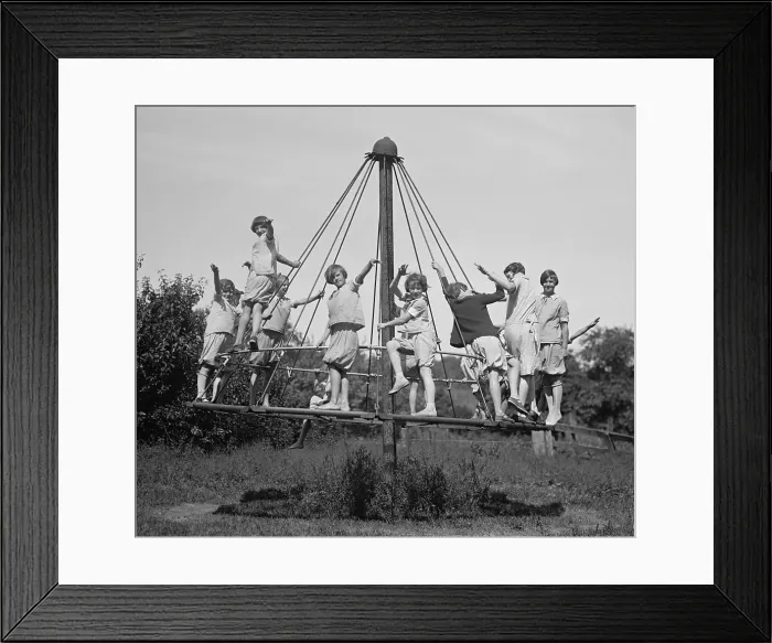 Framed Print : Girls in bloomers on simple merry-go-round, at a Fresh Air Camp of The Child Christ Society, a Catholic lay organization