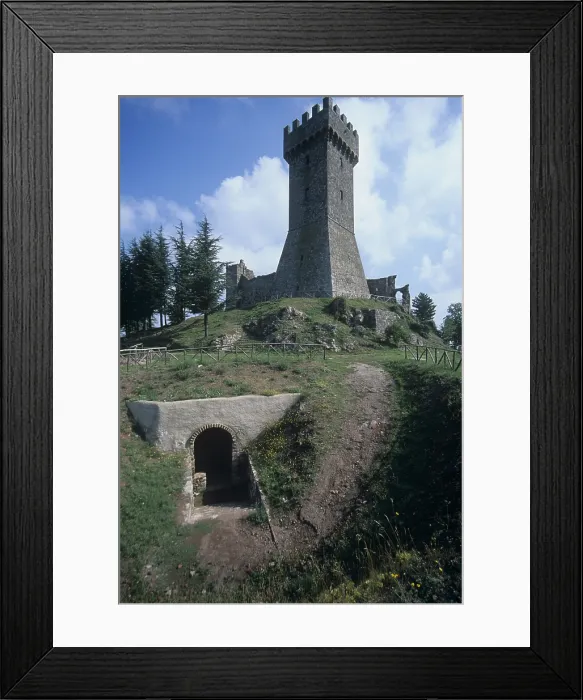 Framed Print : Radicofani fortress, 10th Century - Italy, Tuscany, Radicofani. Whole artwork view. The crenellated tower rebuilt in 1929 Framed Print : Radicofani fortress, 10th Century - Italy, Tuscany, Radicofani. Whole artwork view. The crenellated tower rebuilt in 1929
