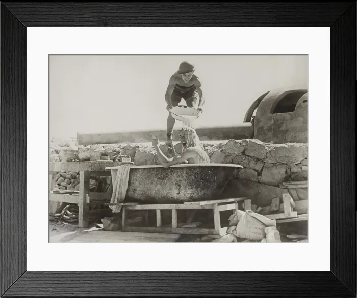 Framed Print : British soldier gives thumbs up for a bath near a coastal gun in the Western Desert. Ca. 1940-42 during World War 2. (BSLOC_2013-12_52)