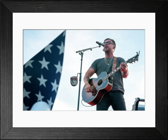 Framed Print : T.J. Osborne, of the Brothers Osborn county duo, performs at July 4th celebrations on the White House South Lawn, July 4, 2023. (BSLOC_2023_8_24)