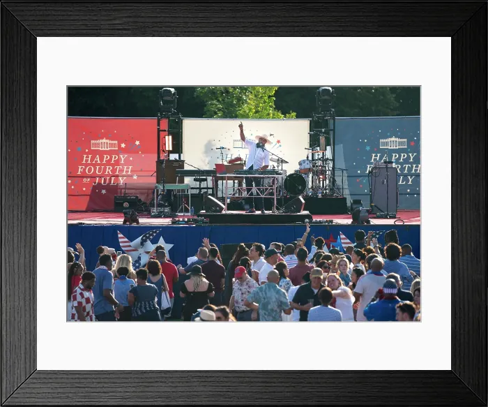 Framed Print : DJ D-Nice performs for White House guests at Independence Day celebrations on the White House South Lawn, July 4, 2023. (BSLOC_2023_8_22)