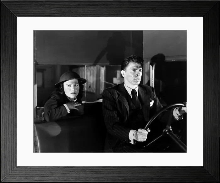 Framed Print : INTERNATIONAL SQUADRON, from left, Olympe Bradna, Ronald Reagan, 1940