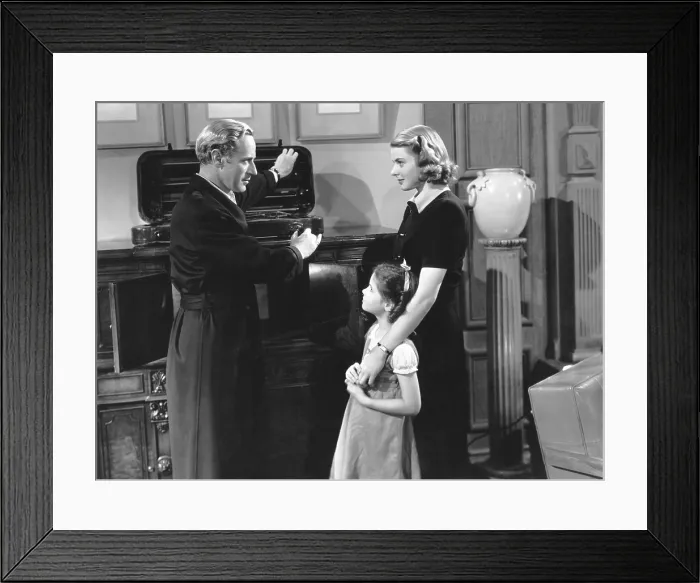 Framed Print : INTERMEZZO: A LOVE STORY, from left, Leslie Howard, Joan Carroll, Ingrid Bergman, 1939