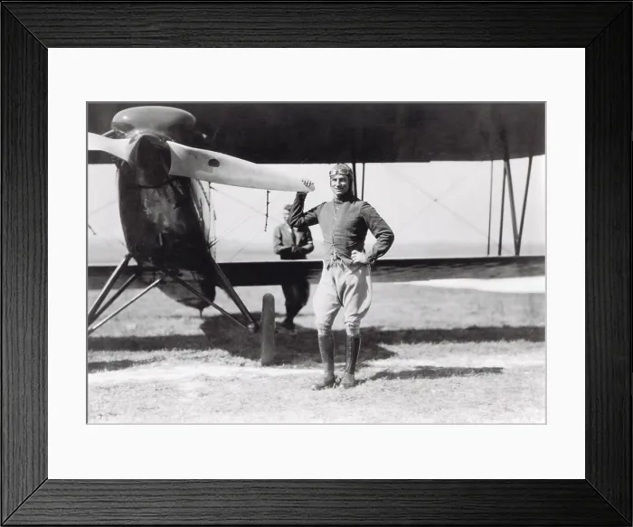 Framed Print : Brigadier General Billy Mitchell, in aviator's clothes, standing beside a pursuit plane, 1920-25. (BSLOC_2016_7_22)