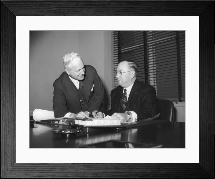 Framed Print : War Production Board leaders oversaw industrial planning in WW2. Production Division Director W. H. Harrison (left), and Chairman, Donald M. Nelson (right) Framed Print : War Production Board leaders oversaw industrial planning in WW2. Production Division Director W. H. Harrison (left), and Chairman, Donald M. Nelson (right)