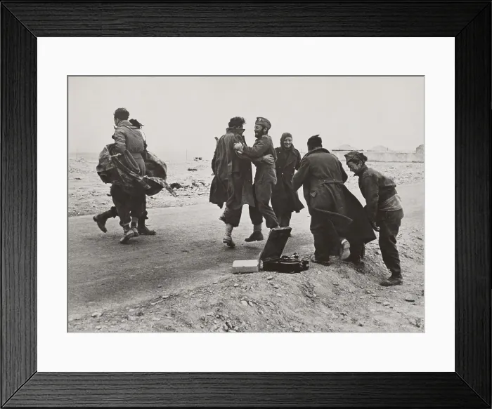 Framed Print : British and New Zealand soldiers dance for joy to music of an Italian gramophone. There were just rescued when British forces who recaptured Bardia, Libya, on Jan