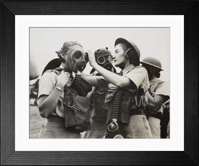 Framed Print : South African Women's Auxiliary Services sergeant is fitted with a gas mask. Unknown location during World War 2. April 1942. (BSLOC_2013-12_66) Framed Print : South African Women's Auxiliary Services sergeant is fitted with a gas mask. Unknown location during World War 2. April 1942. (BSLOC_2013-12_66)