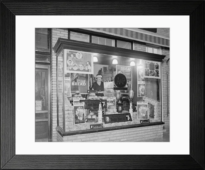Framed Print : Miss Frances Talley in the shop window promotion of the A&P product, Dad's Bread in 1924