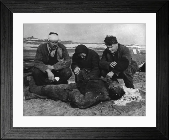 Framed Print : Aftermath of a German massacre of Soviets (Russians) in the Kerch Peninsula, Crimea. The Polyarush family kneel beside the body of their father, 68-year-old Illarion Framed Print : Aftermath of a German massacre of Soviets (Russians) in the Kerch Peninsula, Crimea. The Polyarush family kneel beside the body of their father, 68-year-old Illarion