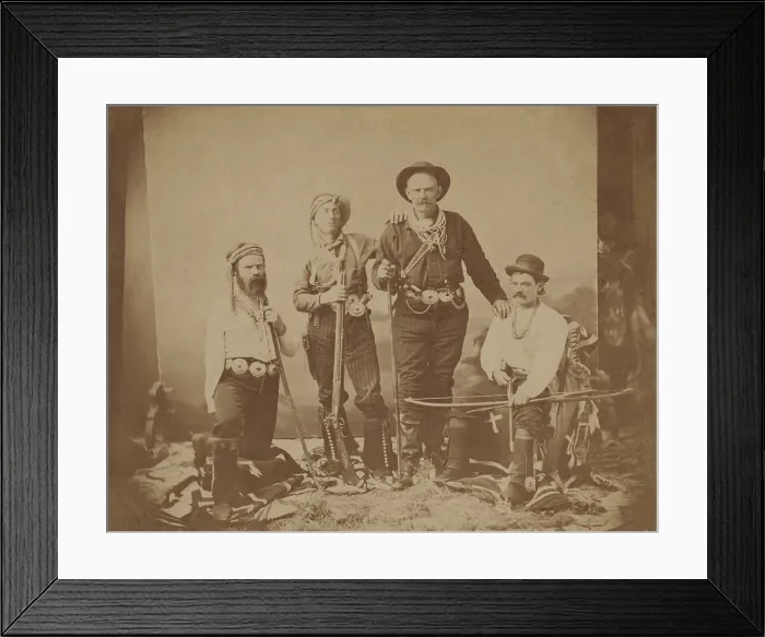 Framed Print : Major John Wesley Powell (left) poses with three unidentified interpreters who accompanied him on exploring expeditions of the western territories after the US Civil War, ca