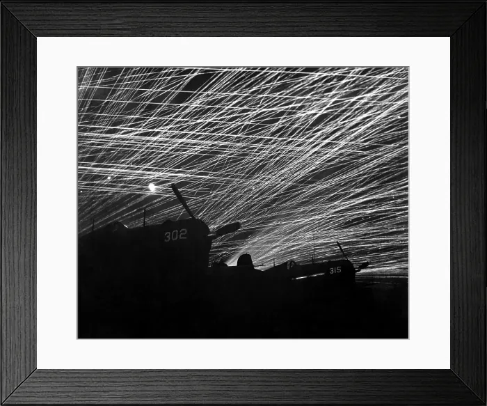 Framed Print : A lacework of anti-aircraft fire by the Marine defenders of Yontan airfield, on Okinawa. Firing is at Japanese night air raiders Framed Print : A lacework of anti-aircraft fire by the Marine defenders of Yontan airfield, on Okinawa. Firing is at Japanese night air raiders