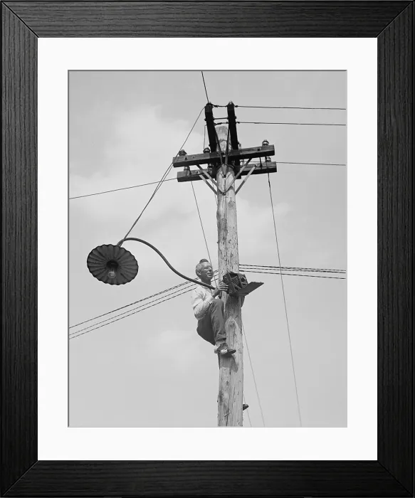 Framed Print : Washington photographer, A.W. Leonard, climbed a utility pole to get the right angle for his picture, 1923 (BSLOC_2016_8_161)