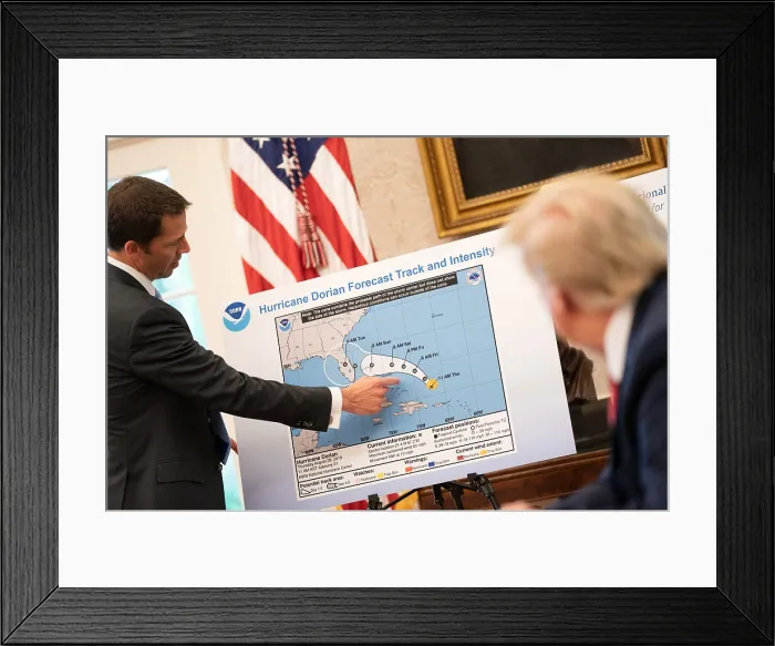 Framed Print : President Donald Trump is briefed on Hurricane Dorian as it approaches the US mainland on Thursday, Aug. 29, 2019