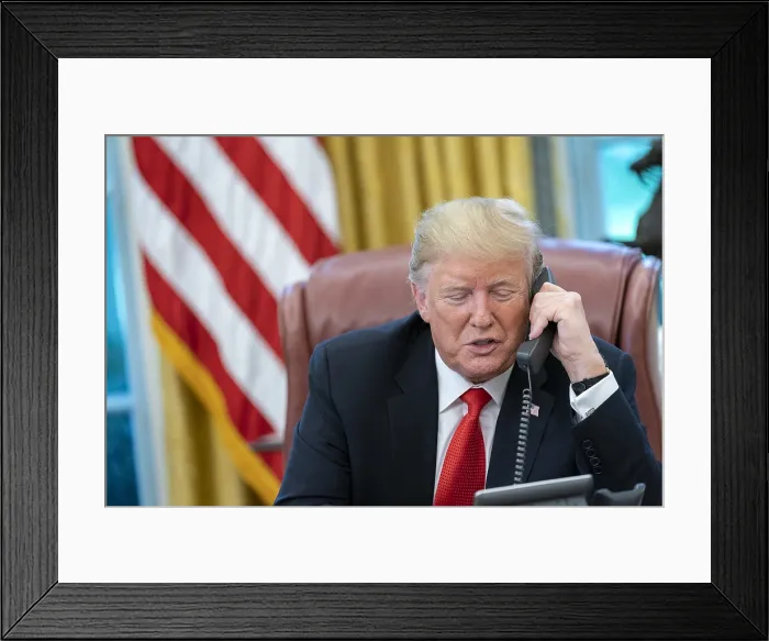 Framed Print : President Donald Trump speaks with Bahamian Prime Minister Hubert Minnis expressing his condolences for the loss of life and damage in the Bahamas, Wednesday, Sept